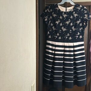 Brand new never worn pleated cream and black dress